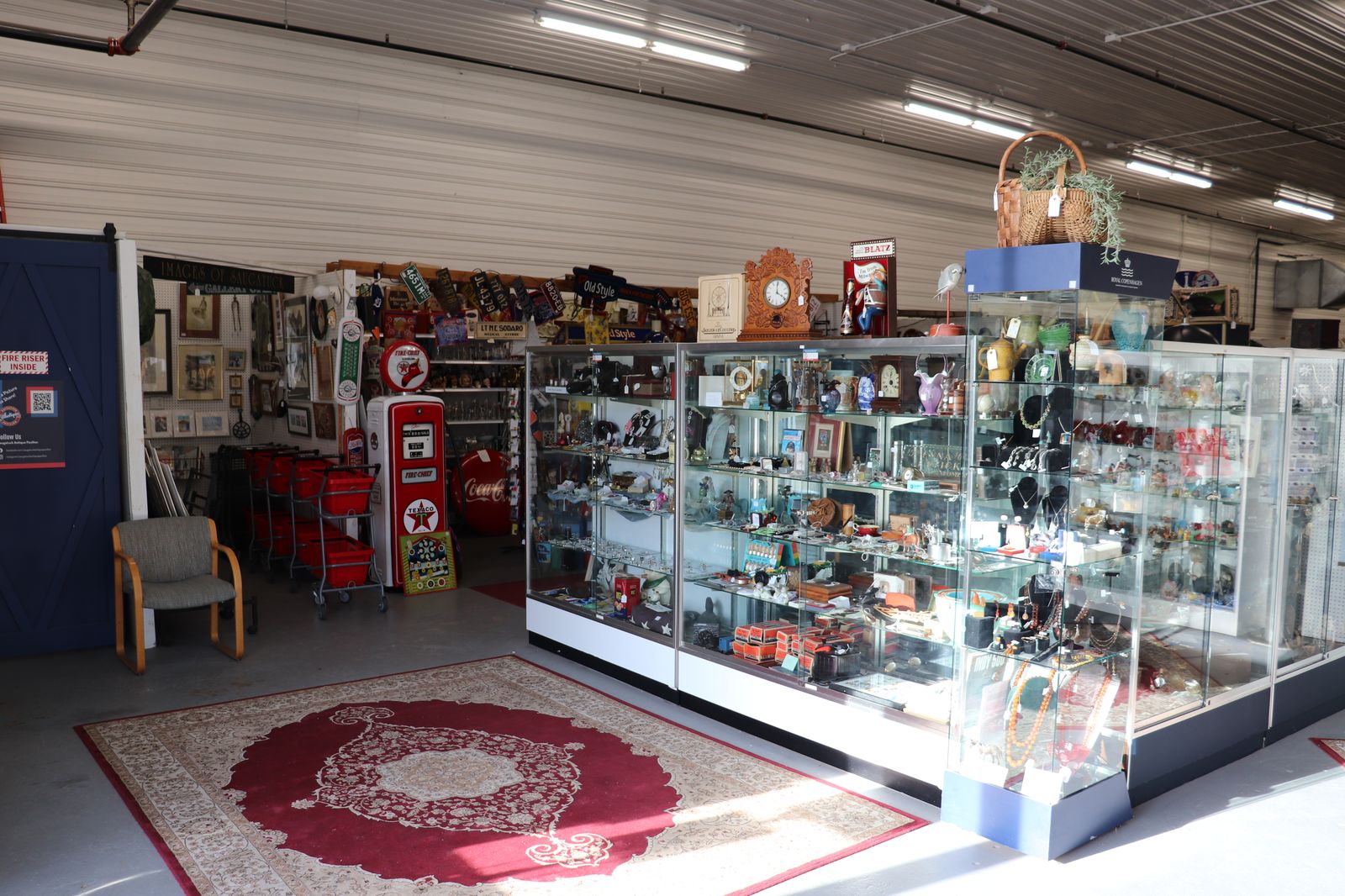 Vintage dolls and collectibles displayed at a Michigan antique mall booth