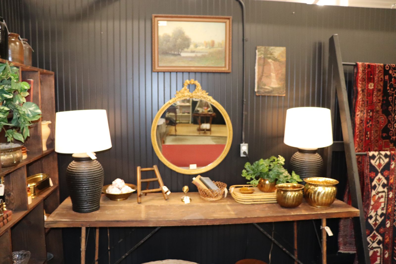 Colorful Depression glass and Pyrex glassware collection displayed at an antique shop