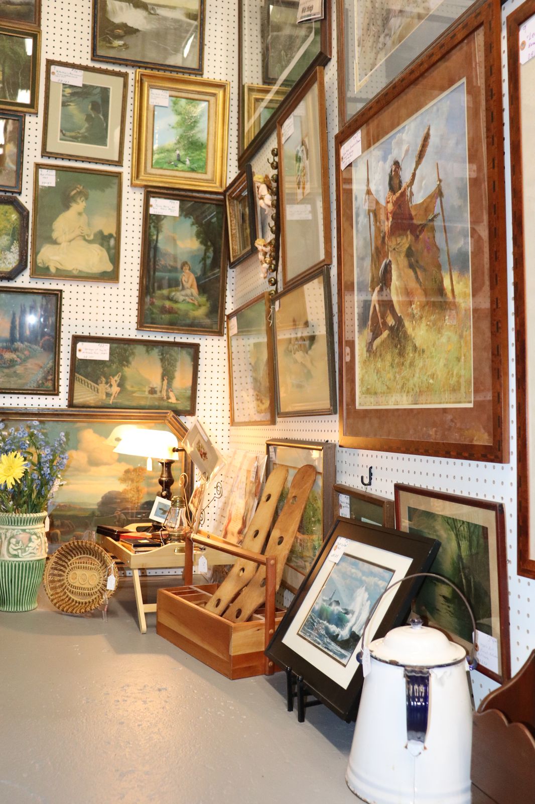 Autographed sports memorabilia and vintage political collectibles displayed at Saugatuck Antique Pavilion